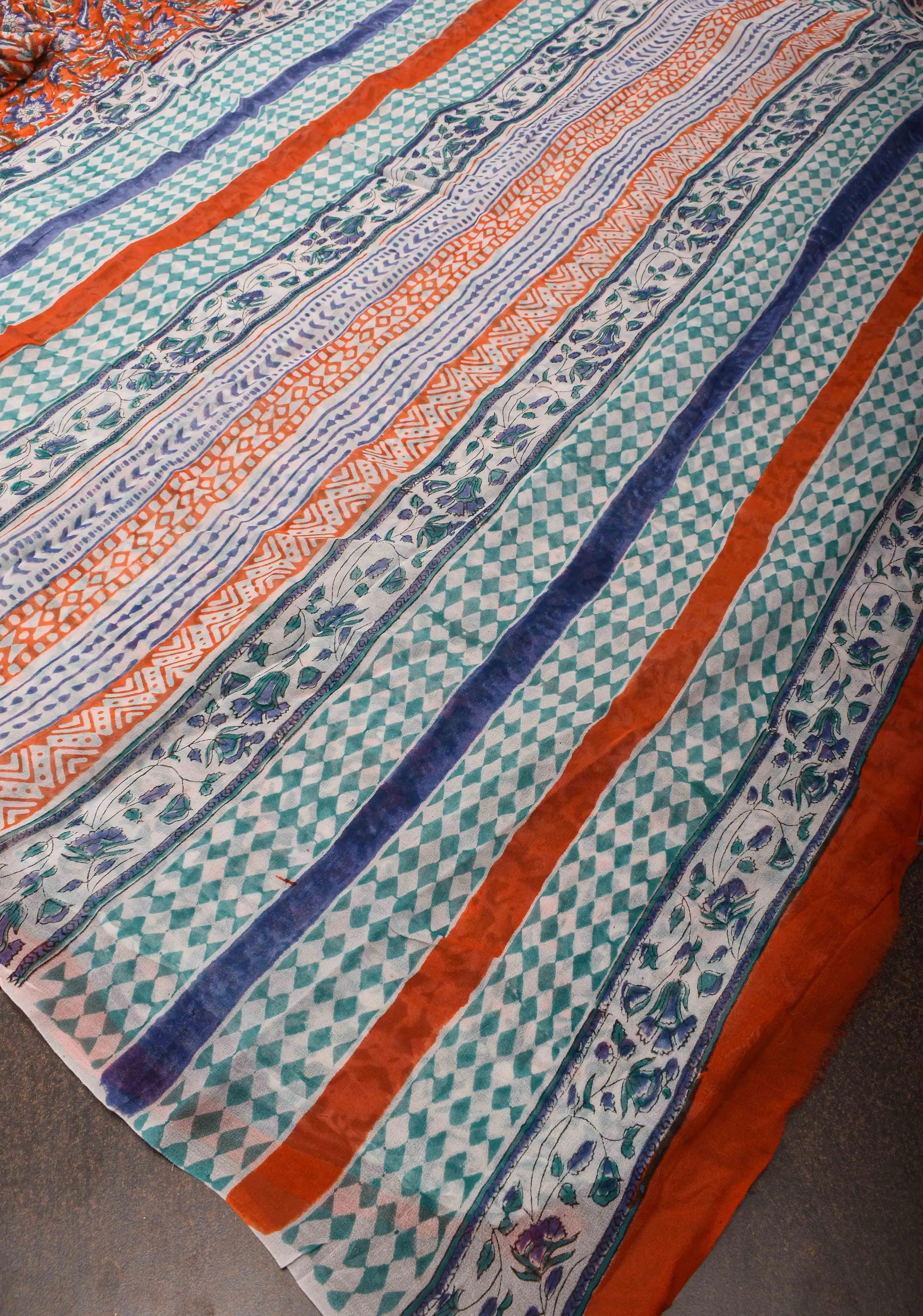 Burnt Orange Georgette Saree with Sanganeri Hand Block Print